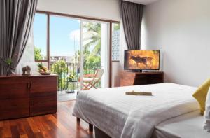 Letto o letti in una camera di The Calm Oasis