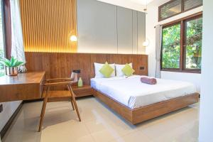 Postel nebo postele na pokoji v ubytování Uluwatu Yoga Resort
