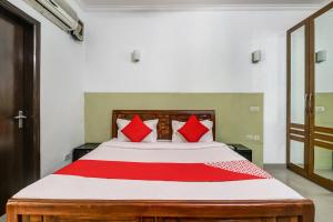 Cama o camas de una habitación en OYO Rajvanshi Palace
