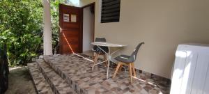 Φωτογραφία από το άλμπουμ του Studio Orchidée - Vue sur jardin et terrasse privée σε Rémire-Camp
