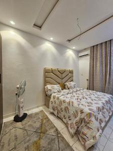 Postel nebo postele na pokoji v ubytování ZeroPoint Apartments