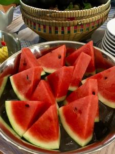 a pan filled with watermelon slices in a bowl at 978 CHIDLOM at JOMTIEN in Jomtien Beach