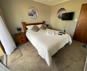 Letto o letti in una camera di Town View Homestay