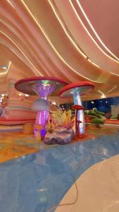 a room with two large mushrooms in a building at Flamigo Hải Tiến in Thanh Hóa +7 photos