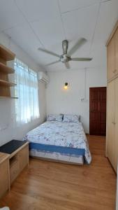 Cama o camas de una habitación en Relax House Raja Uda Butterworth 田园小屋