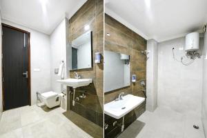 ein Bad mit einem Waschbecken und einem WC in der Unterkunft FabHotel Dwarka Residency in Neu-Delhi