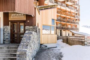 a building in the snow next to a building at Résidence Antarès - maeva Home - Studio 4 personnes - Confort MAE-8504 in Avoriaz +11 photos