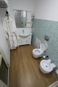 Koupelna v ubytování Espana aparthotel + 37 fotografií
