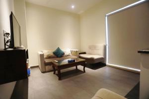 Posezení v ubytování Naylover Hotel Suites