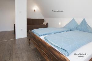 En eller flere senger på et rom på Haus Seeadler - Haus Nordlichter