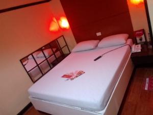 Katil atau katil-katil dalam bilik di Hotel Sogo San Pedro