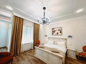 Postel nebo postele na pokoji v ubytování Aspar Boutique Hotel