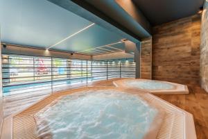 Zdjęcie z galerii obiektu FARO Apartamenty Kasprowicza 20 BASEN w cenie SCHWIMMBAD im Preis w Kołobrzegu