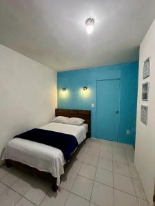 Postel nebo postele na pokoji v ubytování Suites Brisa Marina - Playa Regatas y Malecón