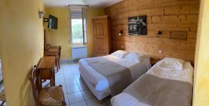 Postel nebo postele na pokoji v ubytování Abel Hôtel