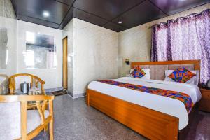 FabHotel Neilkanth客房内的一张或多张床位