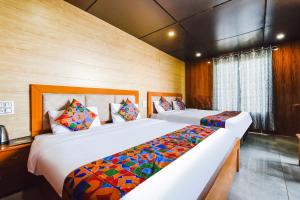 FabHotel Neilkanth客房内的一张或多张床位