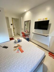 TV a/nebo společenská místnost v ubytování Hotel Sogo - EDSA Trinoma