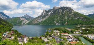 a town with a lake in front of a mountain at RELAX in Ebensee