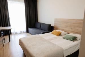 Zakrzówek Residence客房内的一张或多张床位