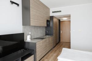 Zakrzówek Residence客房内的一张或多张床位