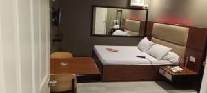 Postel nebo postele na pokoji v ubytování Hotel Sogo Buendia + 7 fotografií