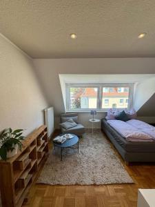 Giường trong phòng chung tại Süßes Apartment im Centrum direkt am Aasee