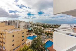 an aerial view of a city with buildings at Costa Adeje Amazing Ocean View BigTerrace in Playa Fañabe