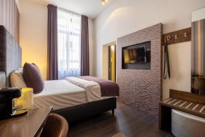 TV a/nebo společenská místnost v ubytování Hotel De Boskar Peer