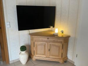 TV a/nebo společenská místnost v ubytování Haus - Neue Düne - Dankern