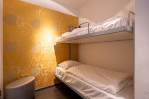 Postel nebo postele na pokoji v ubytování Hotel De Boskar Peer