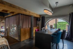 Posezení v ubytování Hotel De Boskar Peer