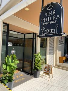 a store front with a sign for the palma event space at The Philea Suite in Kuala Lumpur