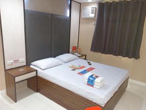 Ένα ή περισσότερα κρεβάτια σε δωμάτιο στο Hotel Sogo Mindanao Avenue