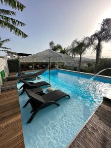 Bazén v ubytovaní Villa Nefeli Prive alebo v jeho blízkosti