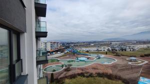 a view of a water park from a building at Apartment Lana in Sarajevo