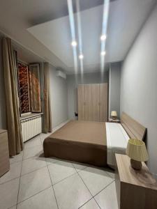 En eller flere senge i et værelse på Bilocale Ottaviano City Sunflower