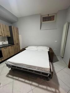 En eller flere senge i et værelse på Bilocale Ottaviano City Sunflower