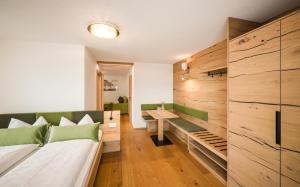 Postel nebo postele na pokoji v ubytování Boutique Pension Erlacher - Adults Only