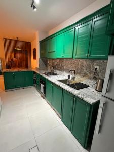 Dapur atau dapur kecil di Lemon garden apartment +9 gambar