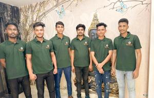 um grupo de homens em camisas verdes posando para uma foto em Hotel Aroma Residency Premium 47 Corporate,Family,Friendly,Couple Friendly Near - Unitech Cyber Park & IKEA em Gurgaon