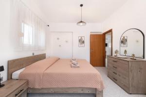 Postel nebo postele na pokoji v ubytování Afandou Panorama Apartment