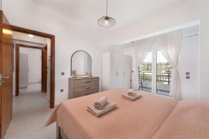 Postel nebo postele na pokoji v ubytování Afandou Panorama Apartment + 11 fotografií
