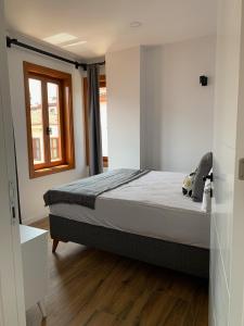 a bedroom with a bed and a window at Sabah Homes in Antalya +39 photos