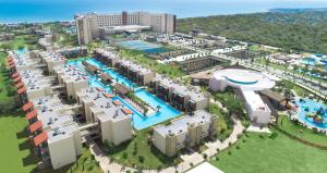 an aerial view of a resort with a swimming pool at Concorde Luxury Resort & Casino in Vokolidha