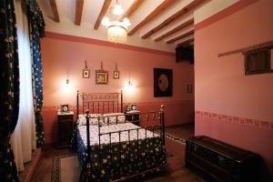 Cama o camas de una habitación en Hospederia Meson de la Dolores