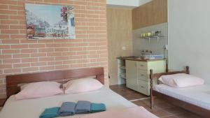 Una cama o camas en una habitación de Laki-in
