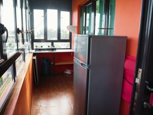 Kuchyň nebo kuchyňský kout v ubytování Le Vergers vue sur mer apartment privée de vacances d'été avec piscine et ascenceur proche de la plage flic en flac