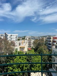 a view of a city from a balcony at Apartment Zoi in Golem