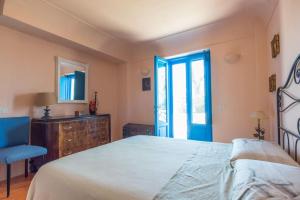 Letto o letti in una camera di La Cisterna, not only landscape